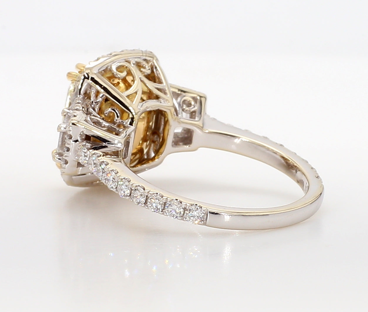 fancy light yellow cushion 3 stone diamond ring 5.05 carat