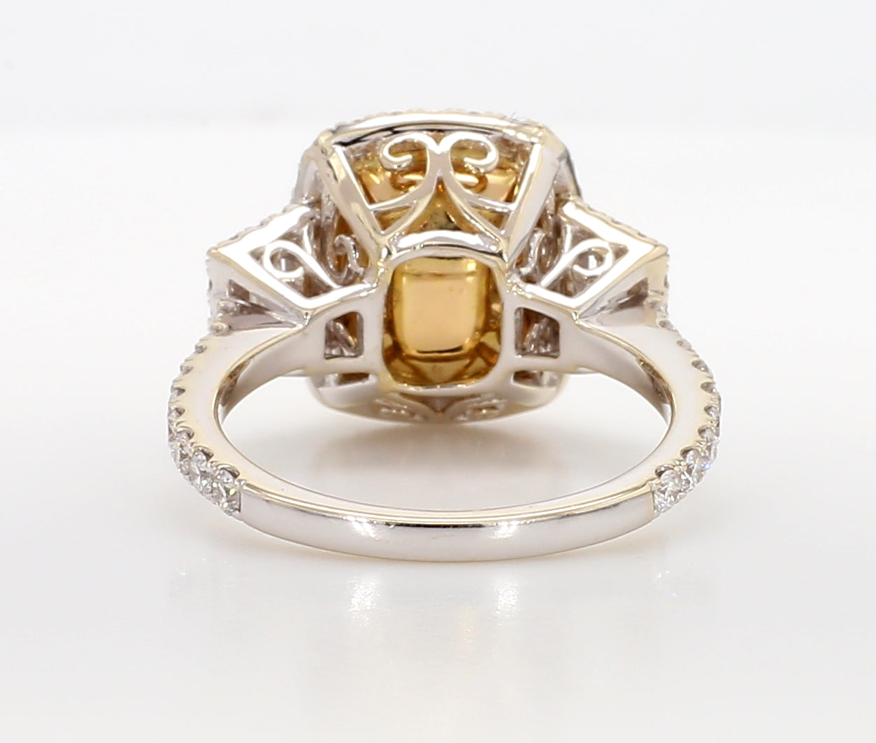fancy light yellow cushion 3 stone diamond ring 5.05 carat