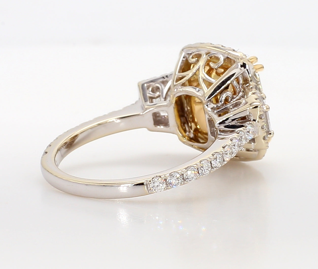 fancy light yellow cushion 3 stone diamond ring 5.05 carat