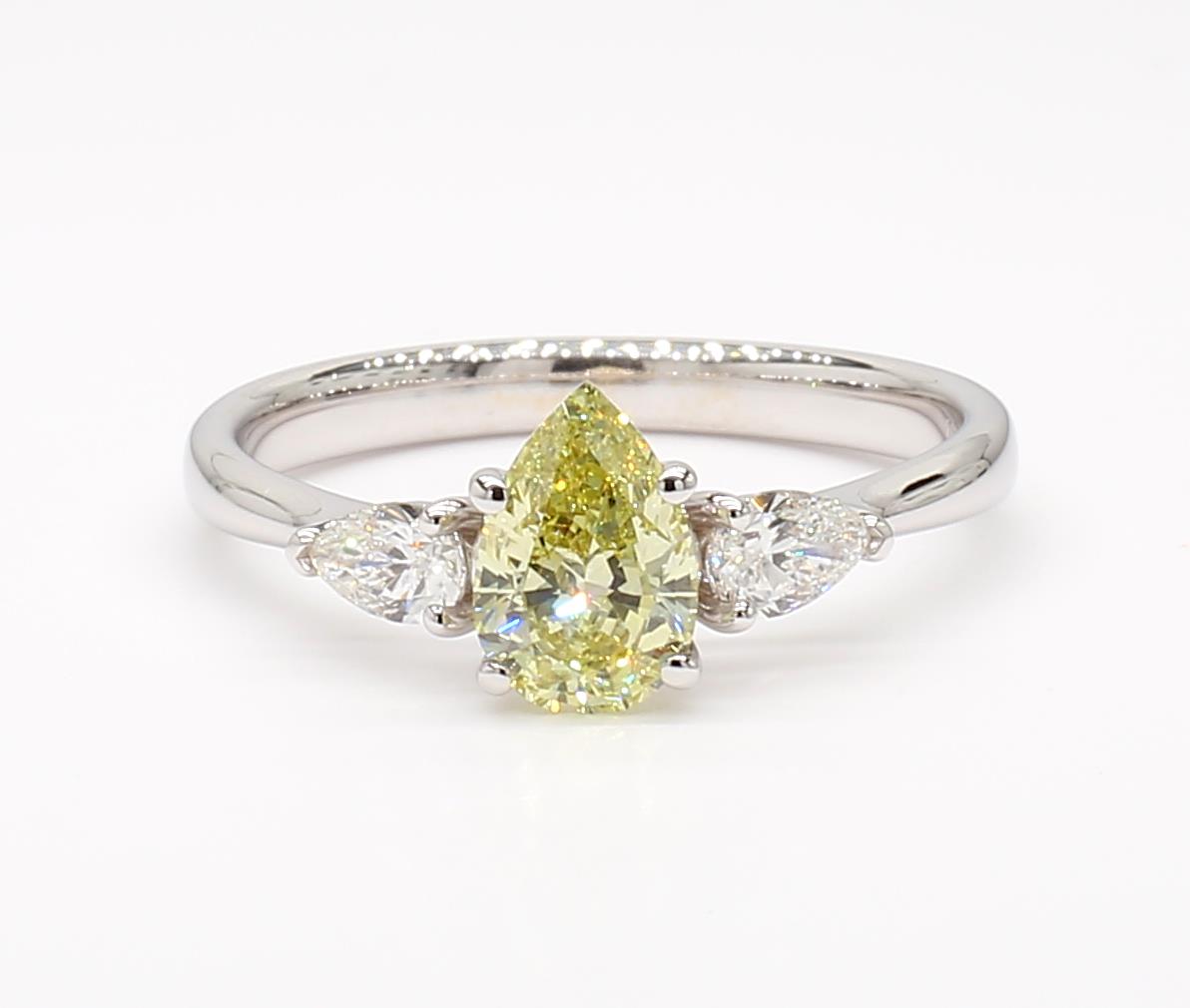 fancy yellow pear diamond 3 stone ring 0.86 carat