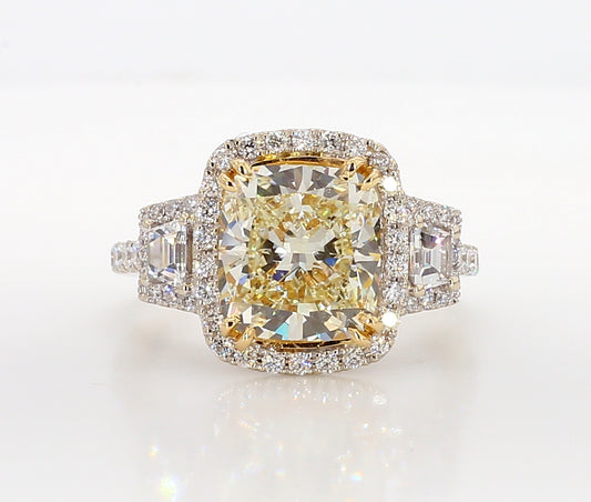 Fancy Light Yellow Cushion 3 stone Diamond Ring  5.05 Carat