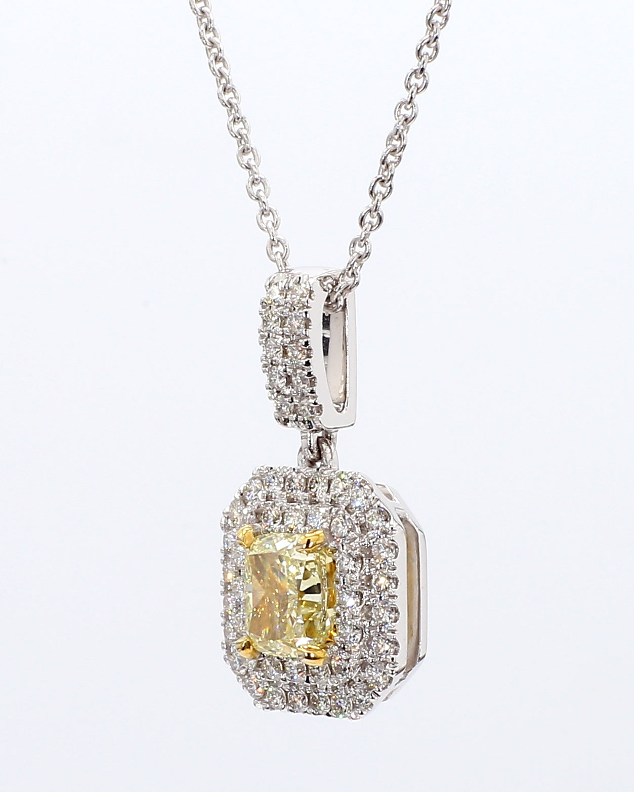 fancy yellow cushion diamond double halo pendant 1.32 carat