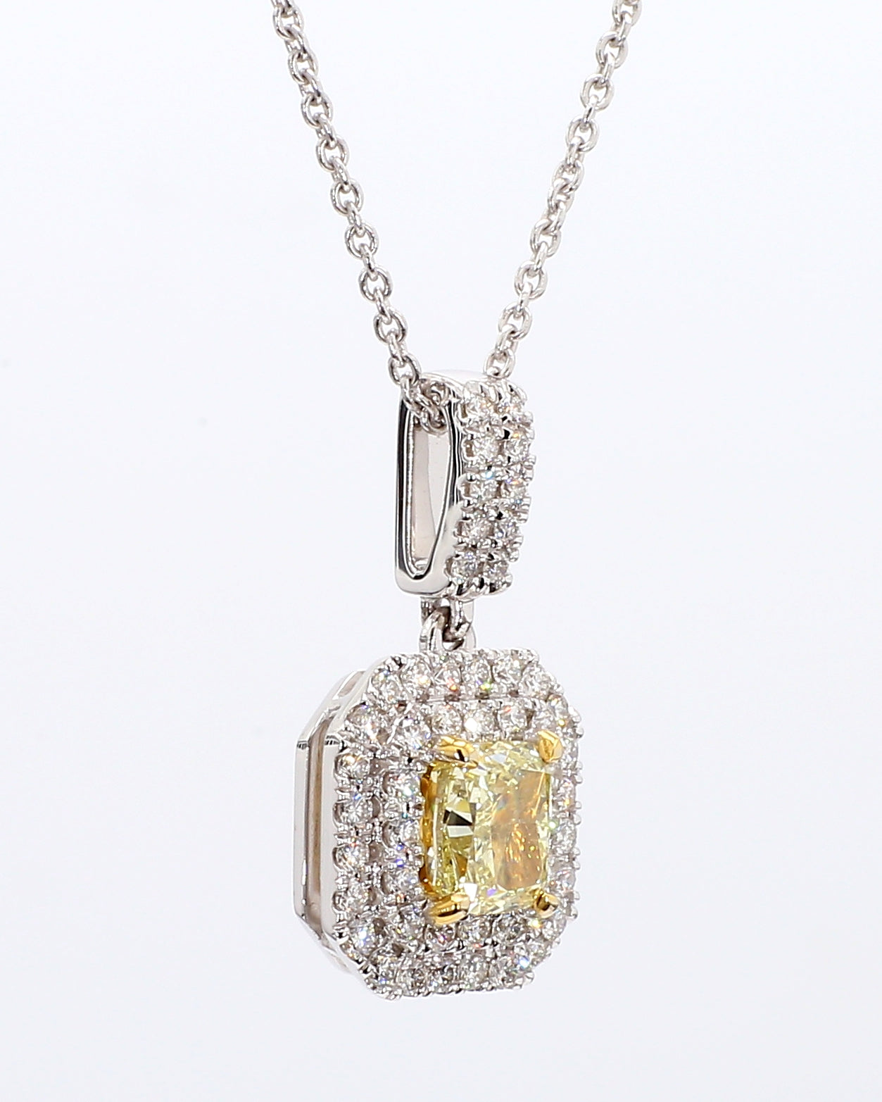 fancy yellow cushion diamond double halo pendant 1.32 carat