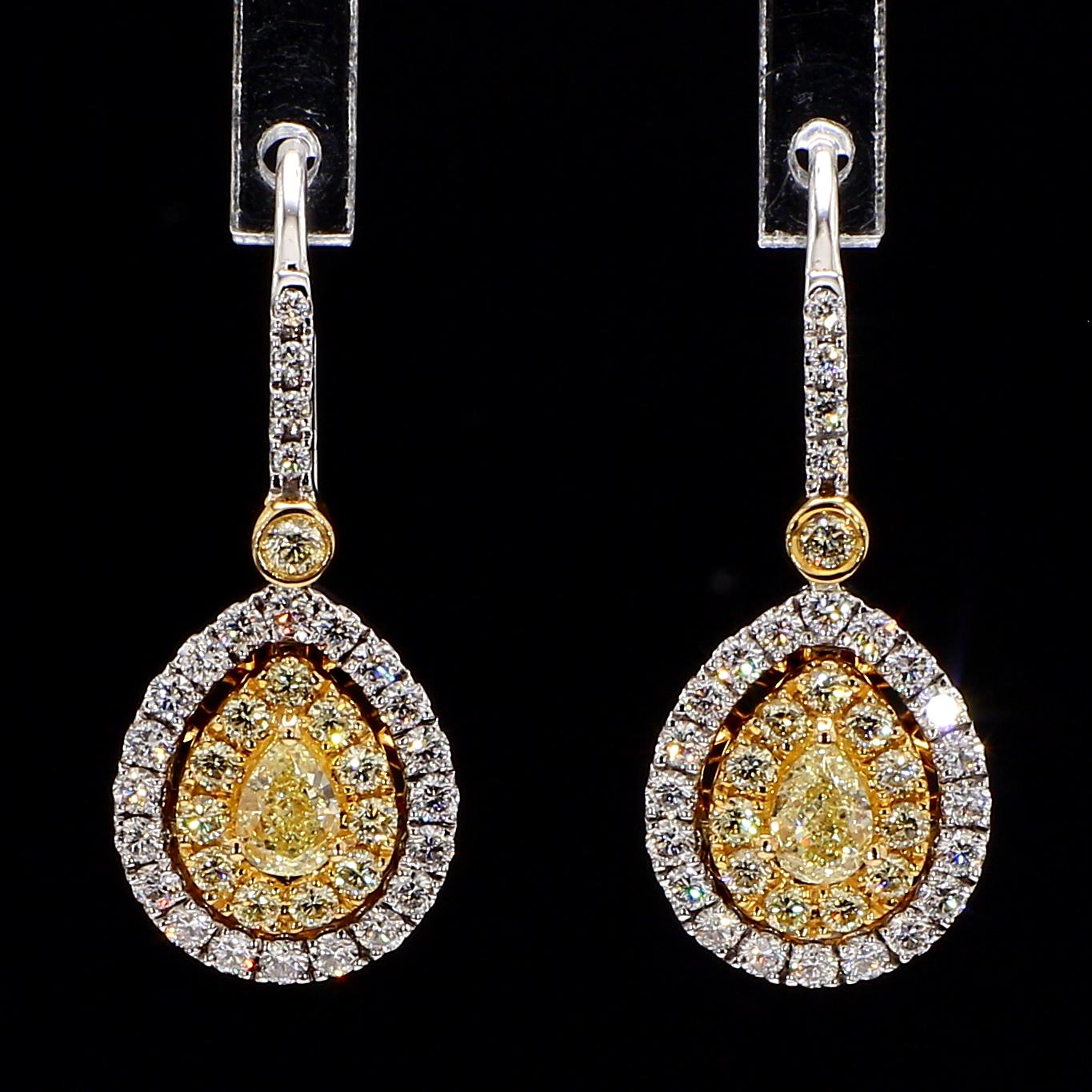 fancy yellow pear diamond double halo drop earrings  1.27 carat