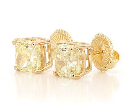 Exceptional Fancy Light Yellow Cushion studs   6.04 Carat