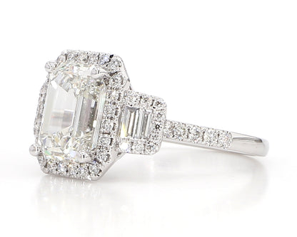 Exceptional Emerald cut 3 stone Diamond Double Halo Ring  3.75 Carat