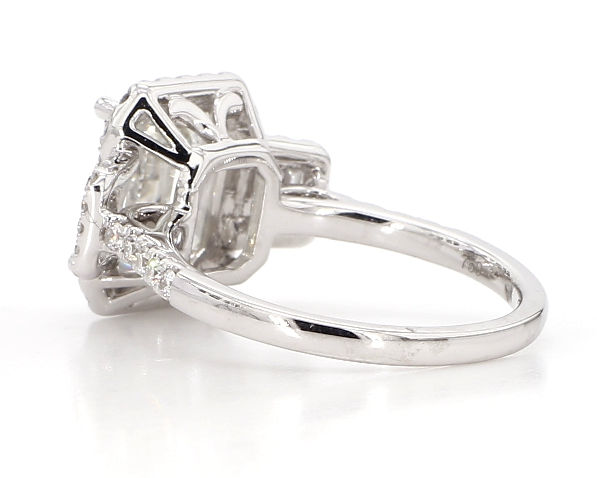 exceptional emerald cut 3 stone diamond double halo ring  3.75 carat