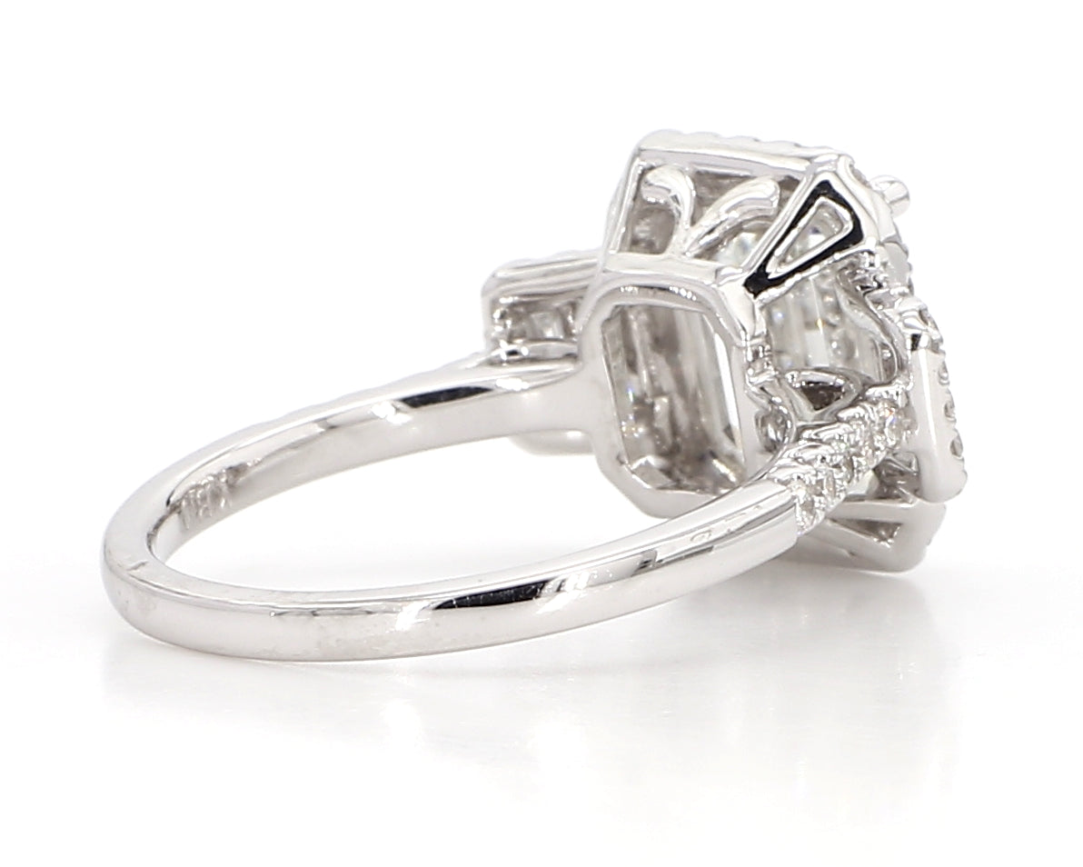 exceptional emerald cut 3 stone diamond double halo ring  3.75 carat