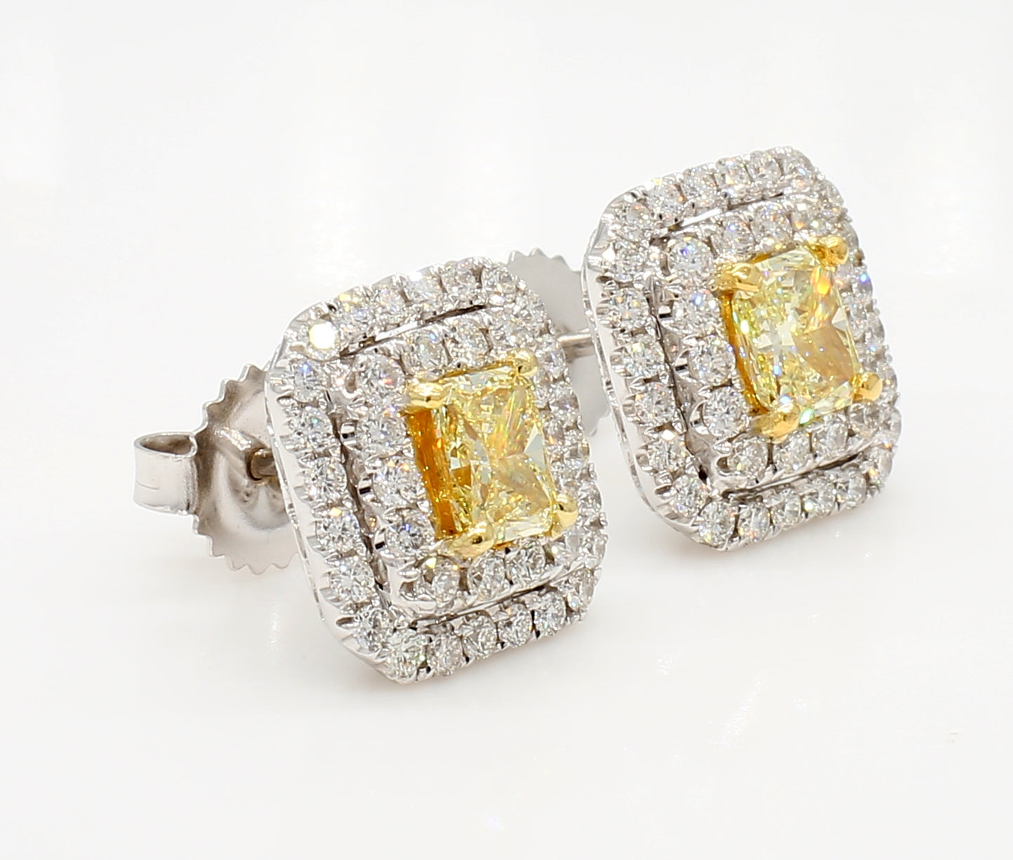 fancy yellow radiant  double halo diamond earrings 2.04 carat