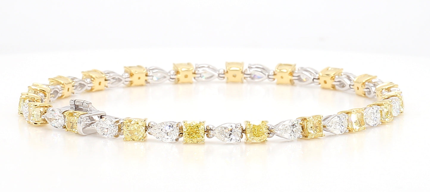 white and fancy yellow cushion diamond cut bracelet 7.49 carats