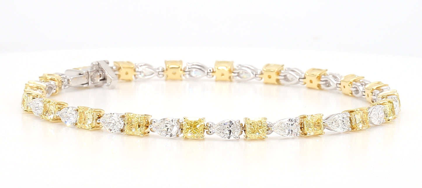 white and fancy yellow cushion diamond cut bracelet 7.49 carats