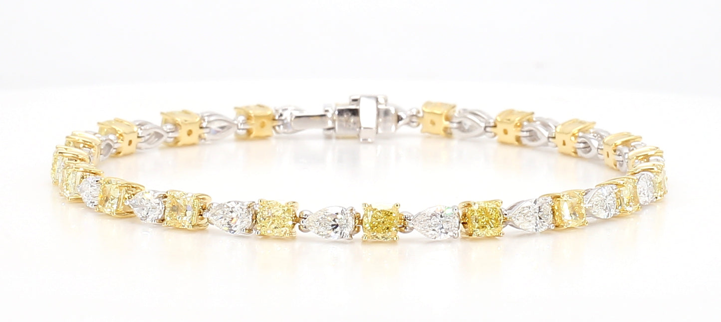 white and fancy yellow cushion diamond cut bracelet 7.49 carats