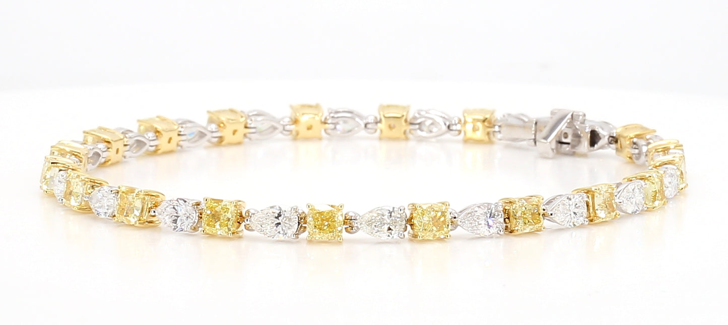 white and fancy yellow cushion diamond cut bracelet 7.49 carats