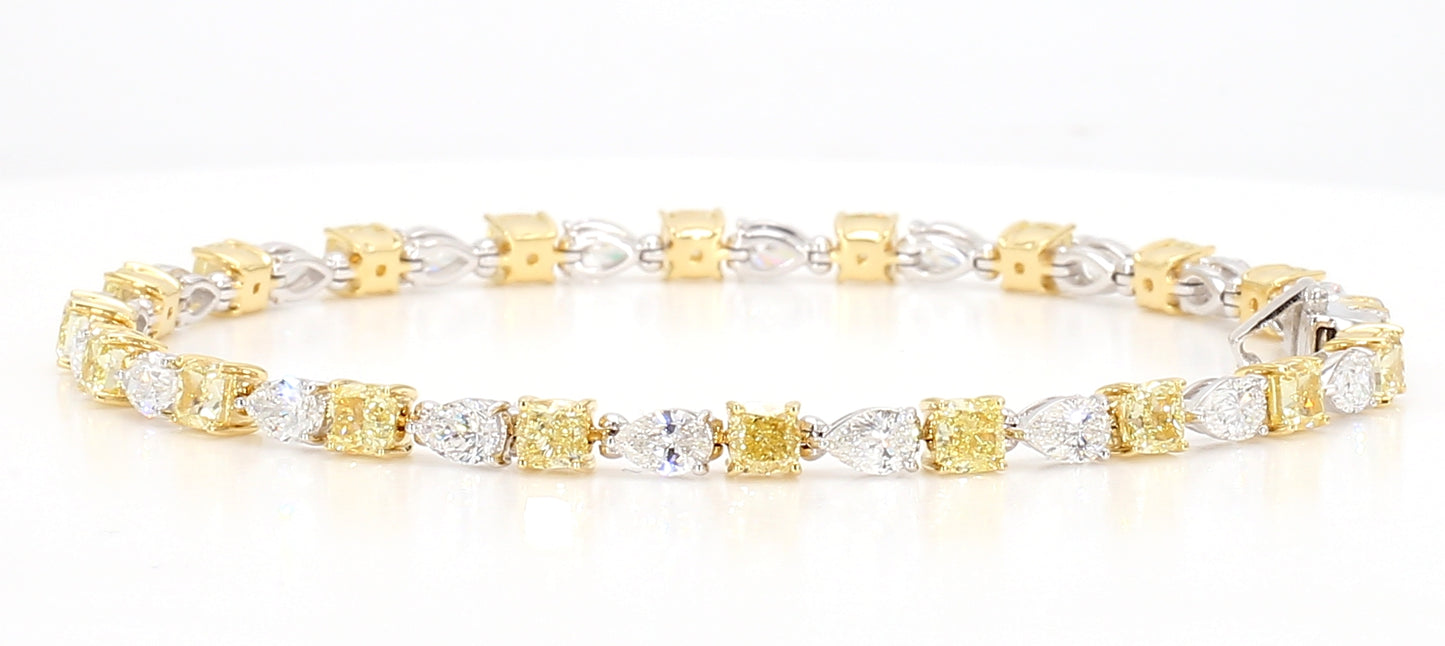 white and fancy yellow cushion diamond cut bracelet 7.49 carats