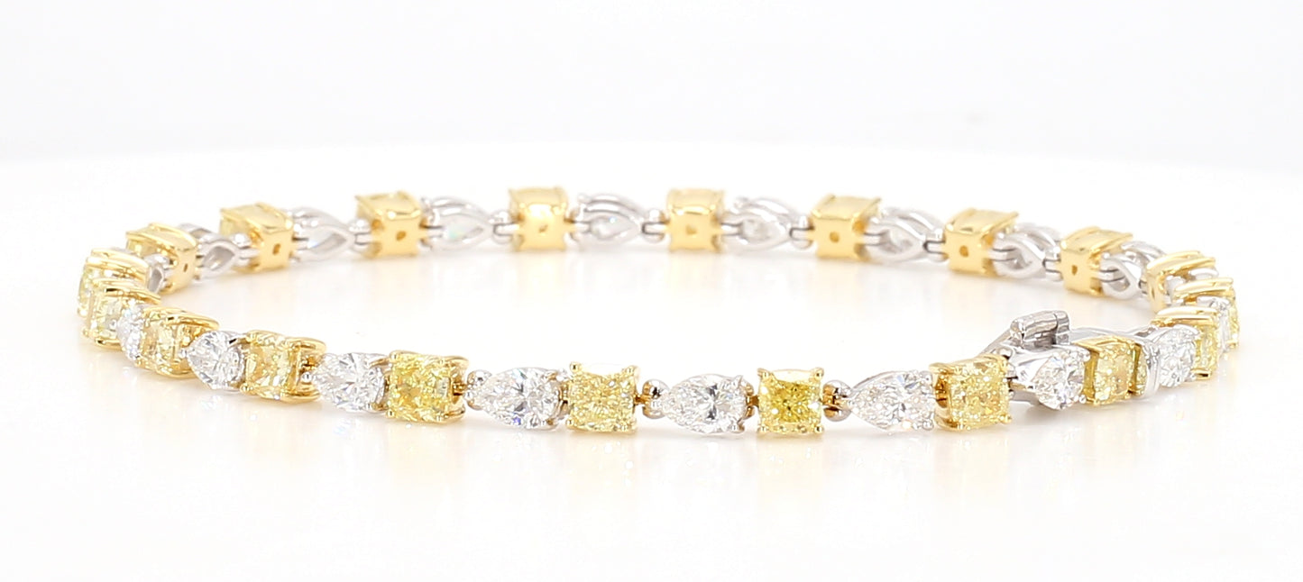 white and fancy yellow cushion diamond cut bracelet 7.49 carats