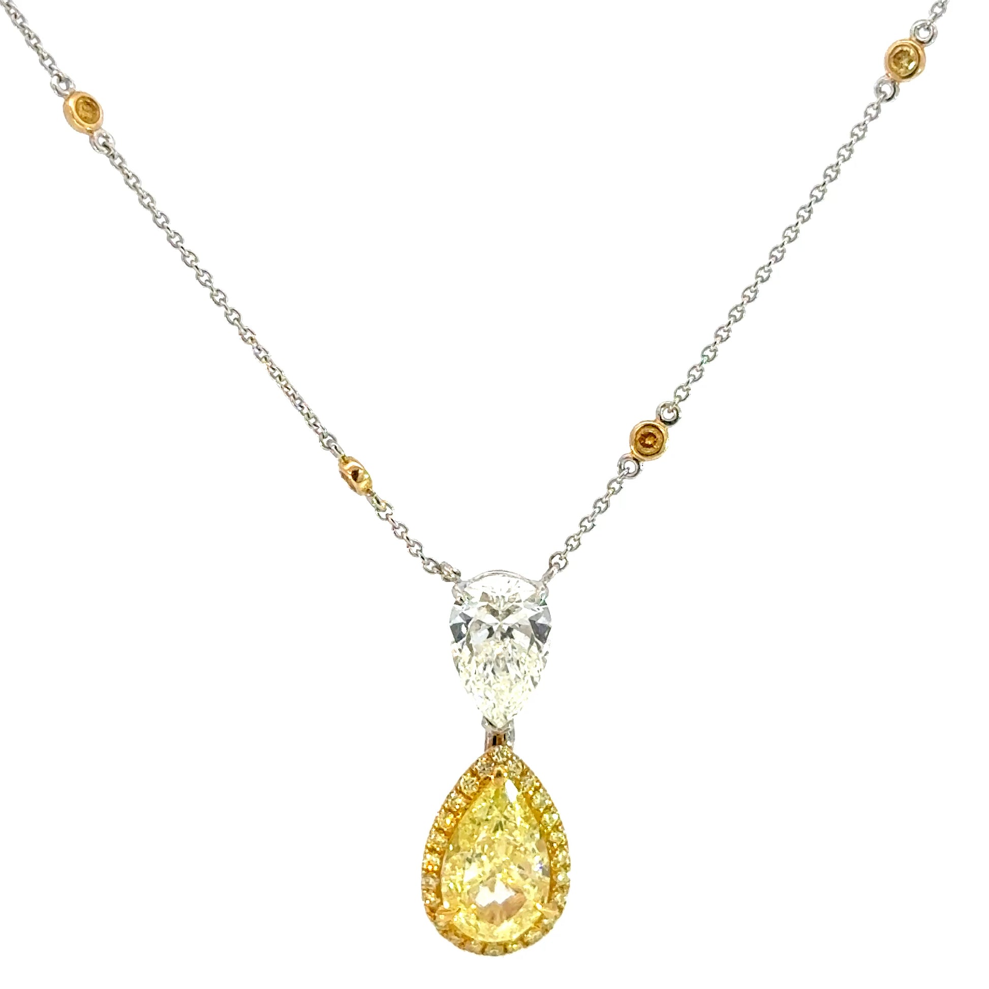 Fancy Yellow White Pear Cut Diamond Two Stone carat)
